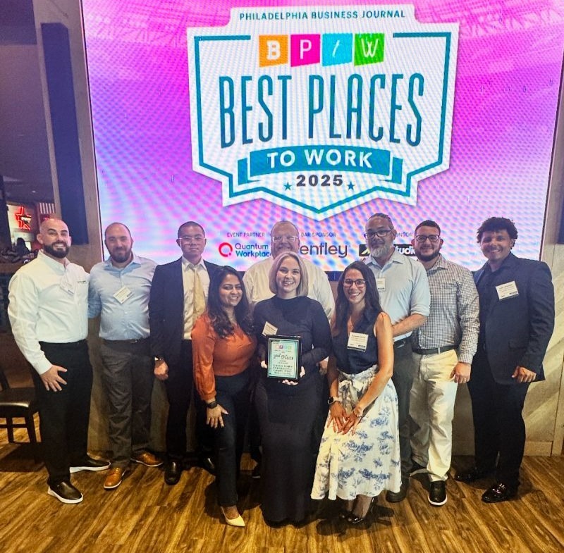 team members from green lawn fertilizing/green pest solutions pose for a photo at the best places to work celebration