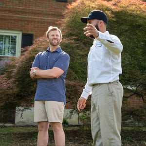 customer talking to a mosquito control expert